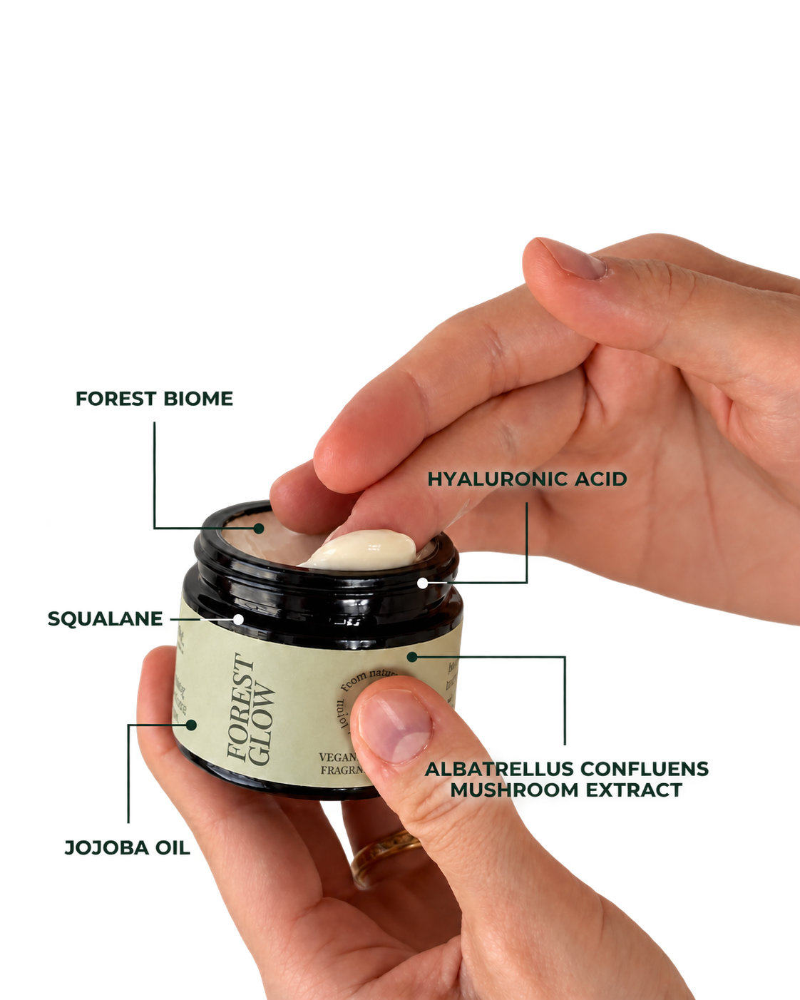 Hands using Pause Nordic Soothing Rich Face Cream, with labelled ingredients